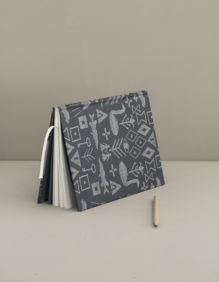 Maailman synty -notebook